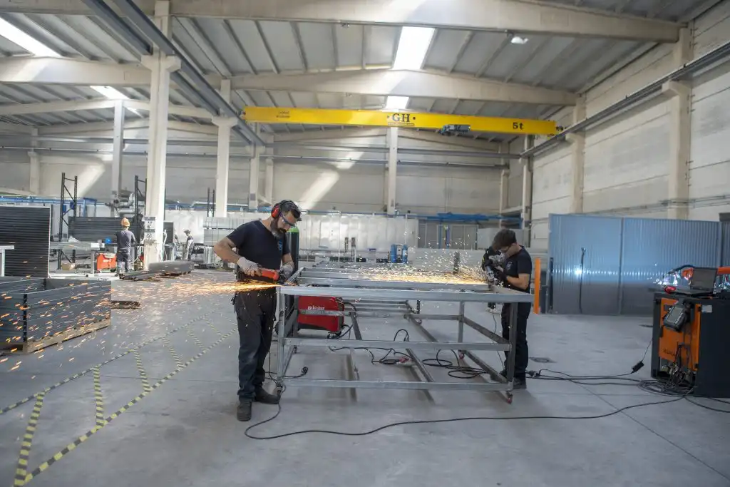 Worker operating in our factory.